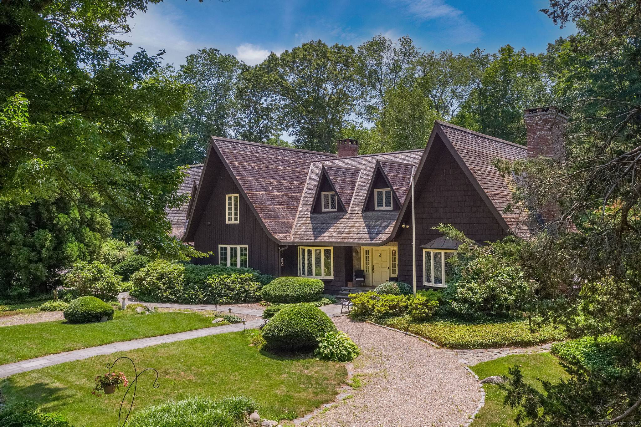 Welcome to Ten Gables, an iconic residence nestled on 2.