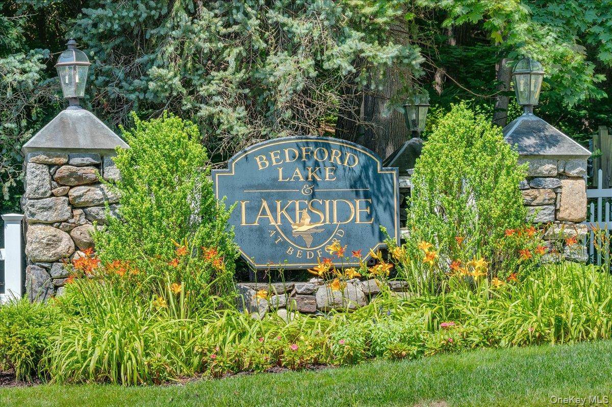 Experience modern elegance and thoughtful design in this exquisite condo nestled in the highly sought after Lakeside of Bedford community.