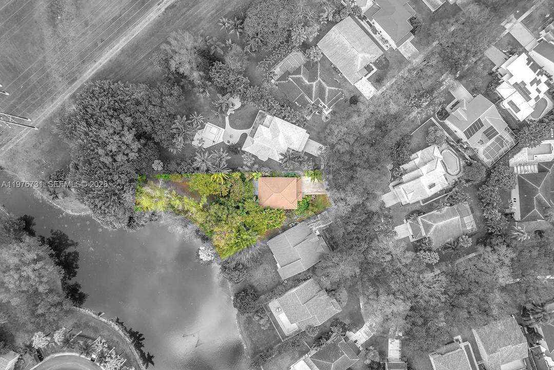 Magnificent one of a kind an expansive 14, 938 square foot lakefront premium lot in Embassy Lakes, Cooper City.