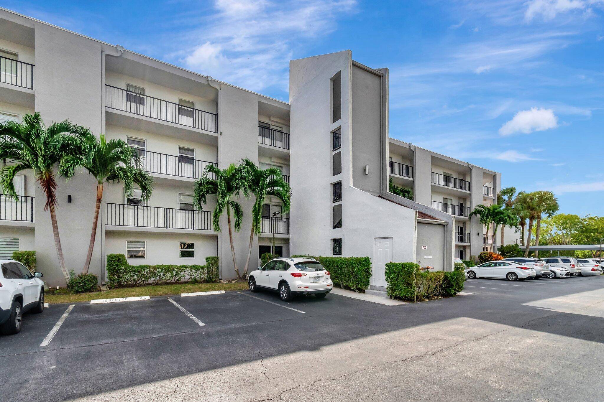 Step inside this beautiful, spacious 4th floor apartment and you will be amazed at the spectacular, unobstructed views of the golf course, canal, and pool.