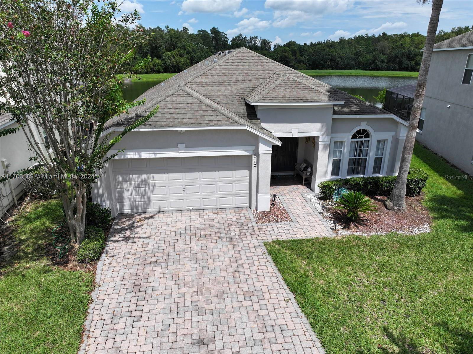 This stunning fully furnished 4 bedroom, 3 bath home will captivate you with its charming view of a private pond in the exclusive gated community of Cumbrian Lakes.