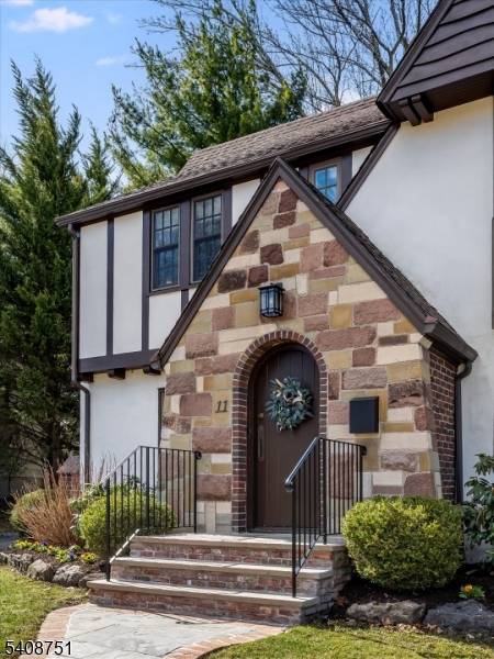 This beautifully renovated 1931 Tudor style home blends timeless architecture with modern comfort, ideally located just one block from Verona Park.