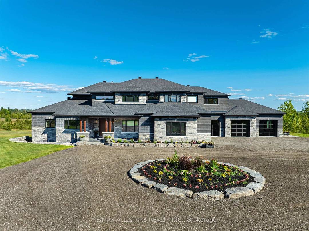 Welcome to this extraordinary custom built luxury estate, a private hilltop retreat set on 36 acres of rolling countryside with breathtaking panoramic vistas.