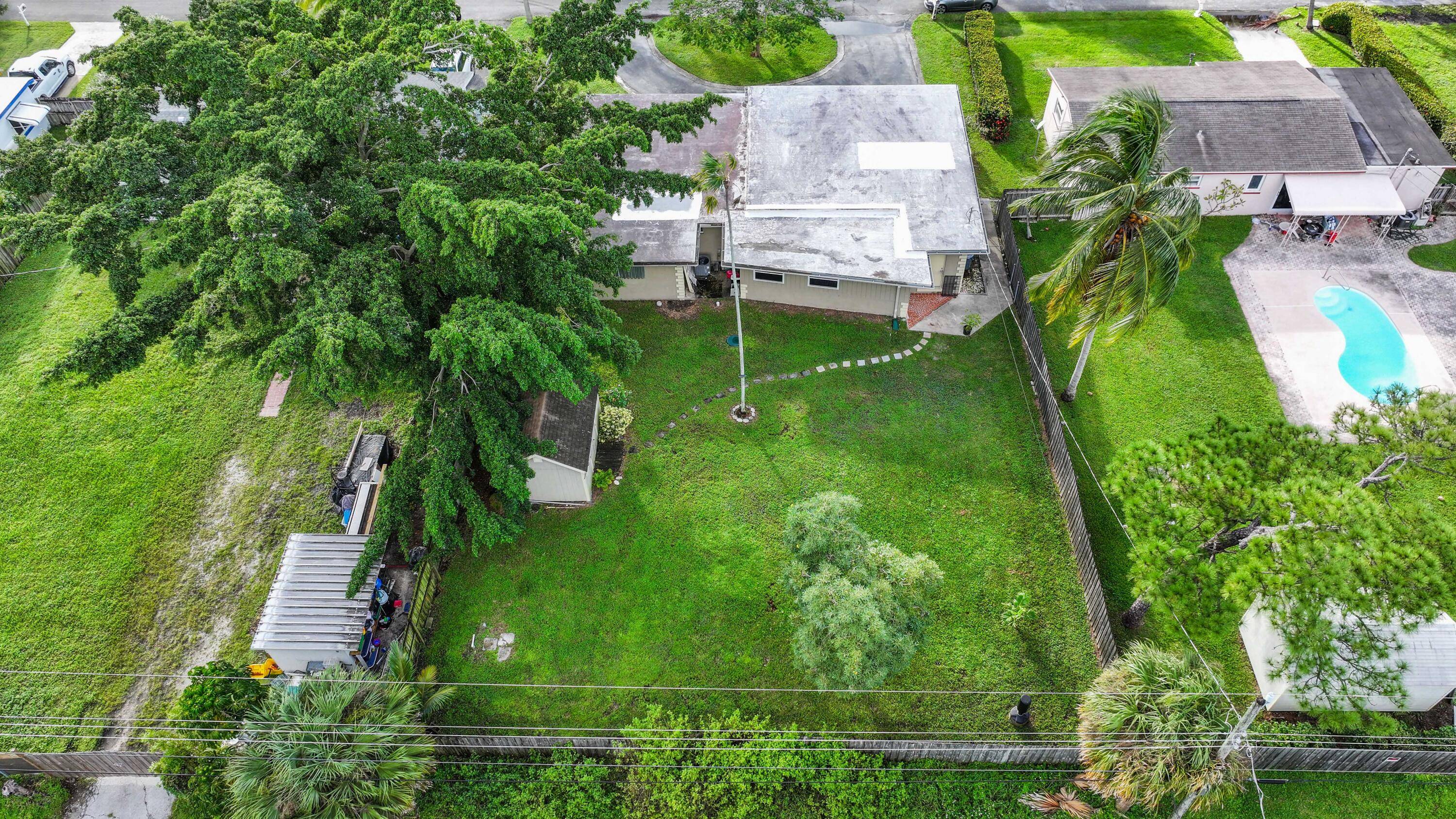 Introducing 822 Burch Drive, your forever or starter home within an ideal location in West Palm Beach with close proximity to Downtown City Place, iconic Palm Beach, Okeeheelee Park, Wellington, ...