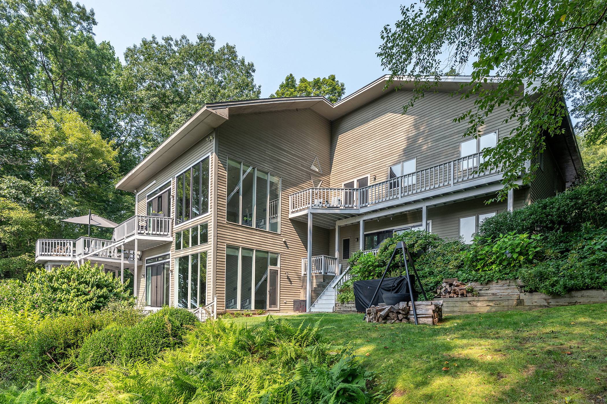 Enjoy breathtaking sunsets from your fully renovated contemporary waterfront retreat !