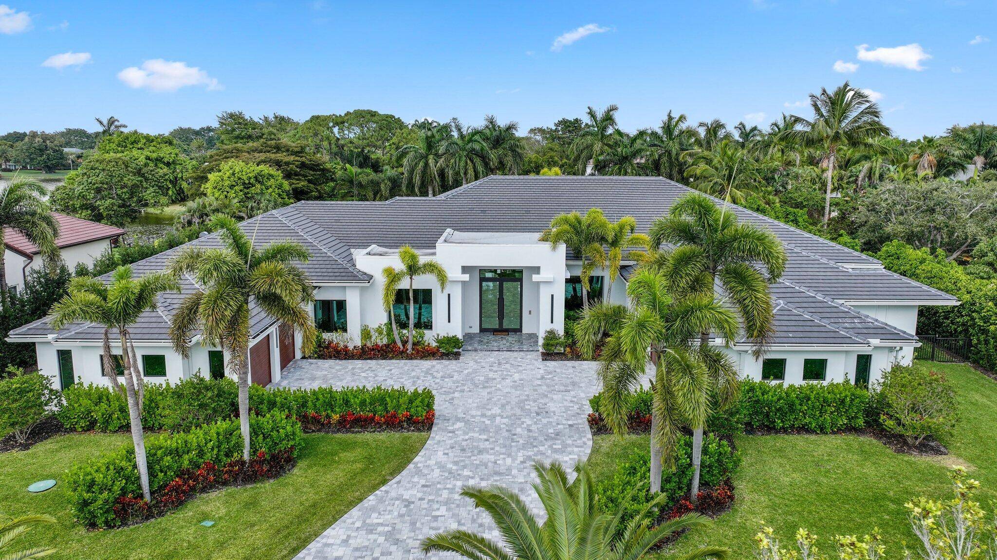 Nestled within the prestigious gated community of Long Lake Estates, this newly constructed contemporary architectural masterpiece offers an unparalleled opportunity to own a true trophy property.