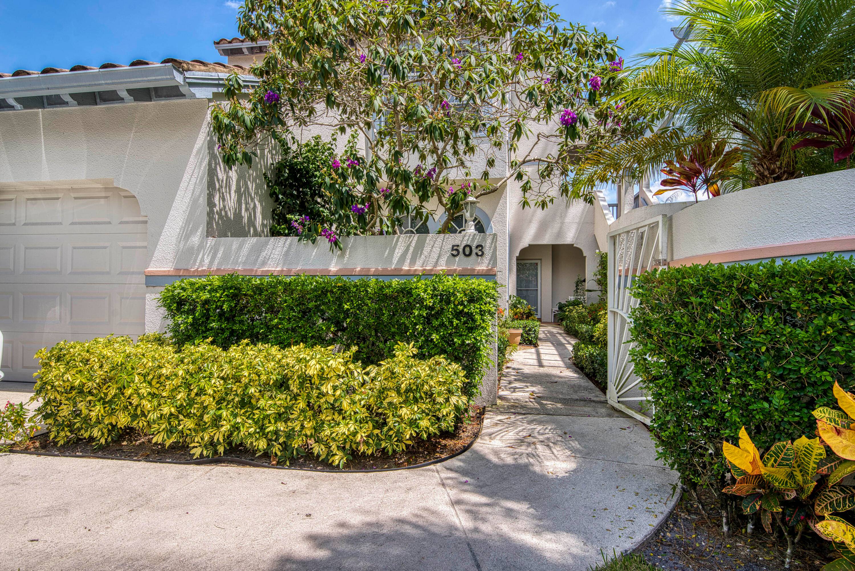 Welcome to 503 Ryder Cup Cir S, a stunningly updated 3BR 2BA home nestled in the sought after Ryder Cup Villas at PGA National.