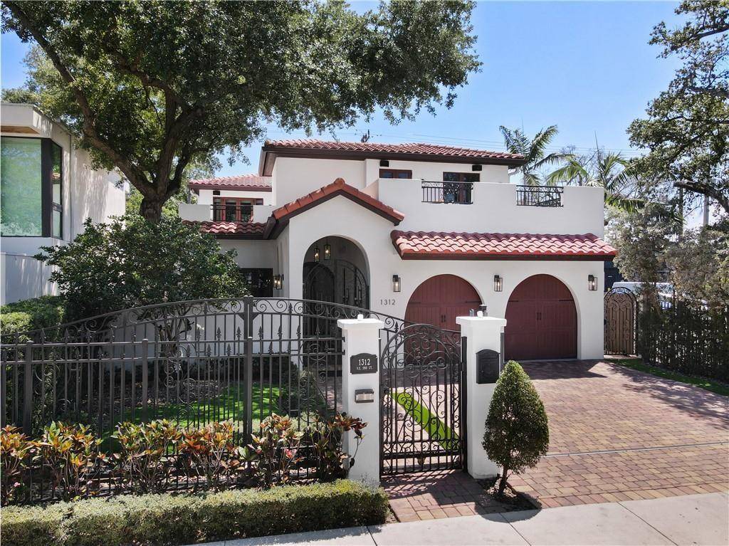LIVE THE LAS OLAS LIFESTYLE IN THIS STUNNING WALLED amp ; GATED SPANISH MODERN RETREAT !
