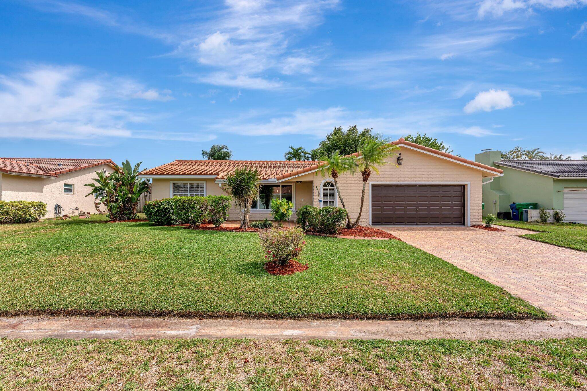 This spacious single family home in Coral Springs offers 4 BR, 2 BA, 2, 463 sq ft of modern living space on a quiet street close to parks major highways.