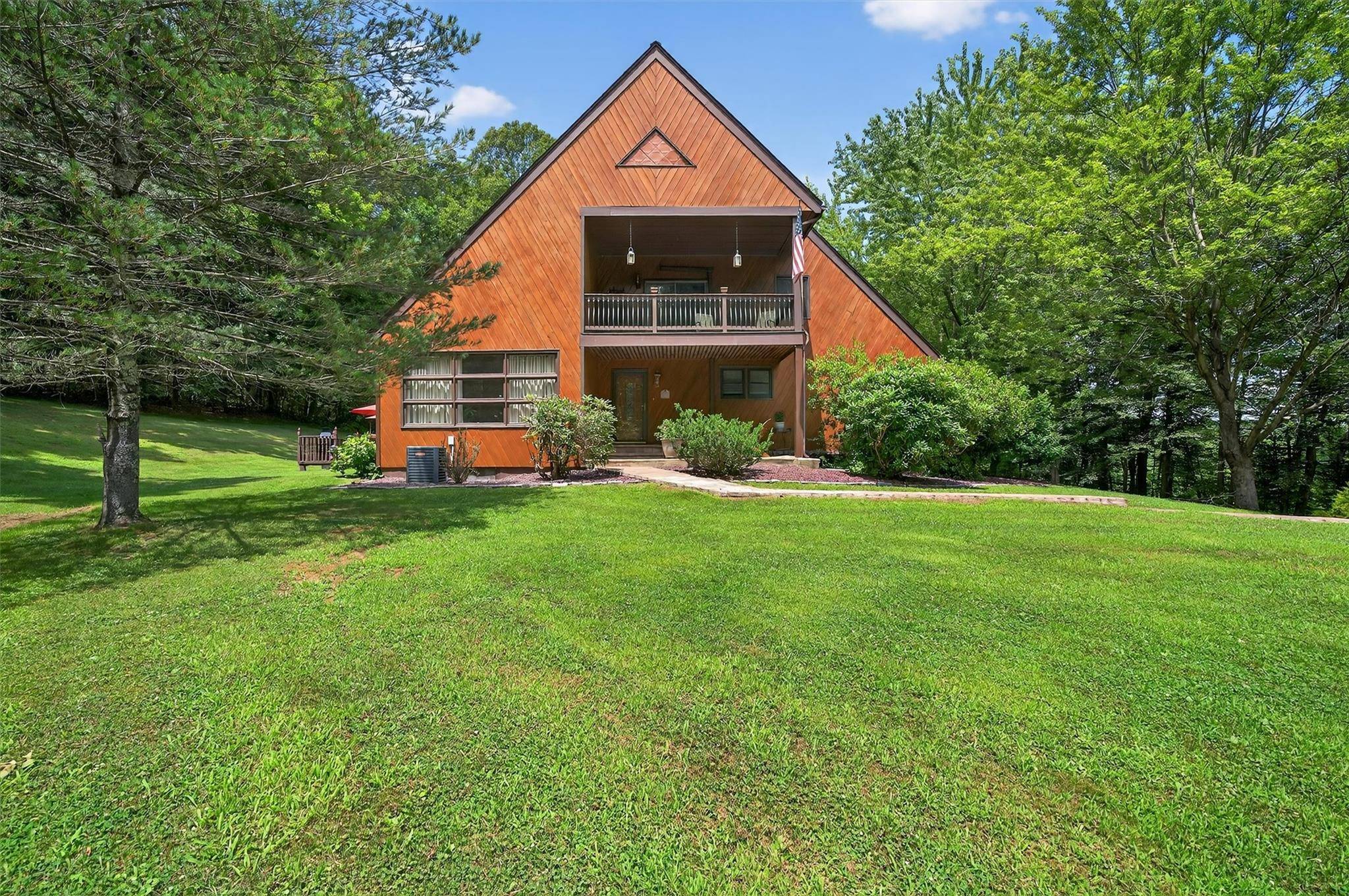 Contemporary Charm with a Unique Floor Plan and First Floor Living !