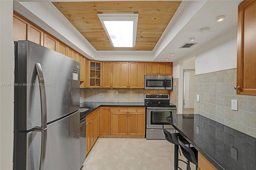 Live the ultimate Aventura lifestyle in this beautifully updated two story townhouse featuring 3 bedrooms and 2.