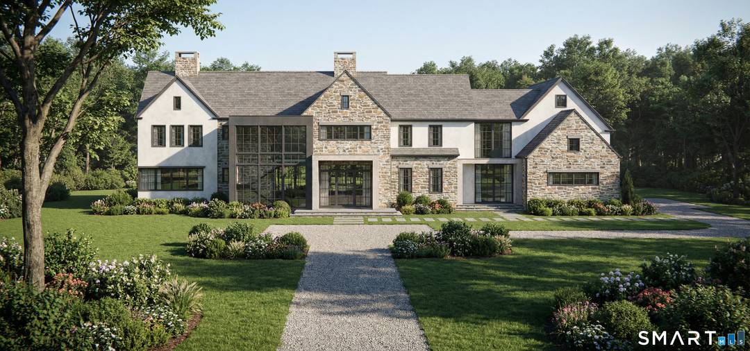 Set within artisan stone walls with curated flowering landscapes, this magnificent stone and stucco residence is a masterful tribute to Southport's enduring architectural legacy.