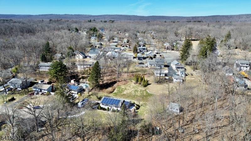Welcome to 27 Caro Drive nestled on a quiet residential street in the desirable Oak Ridge section of West Milford.