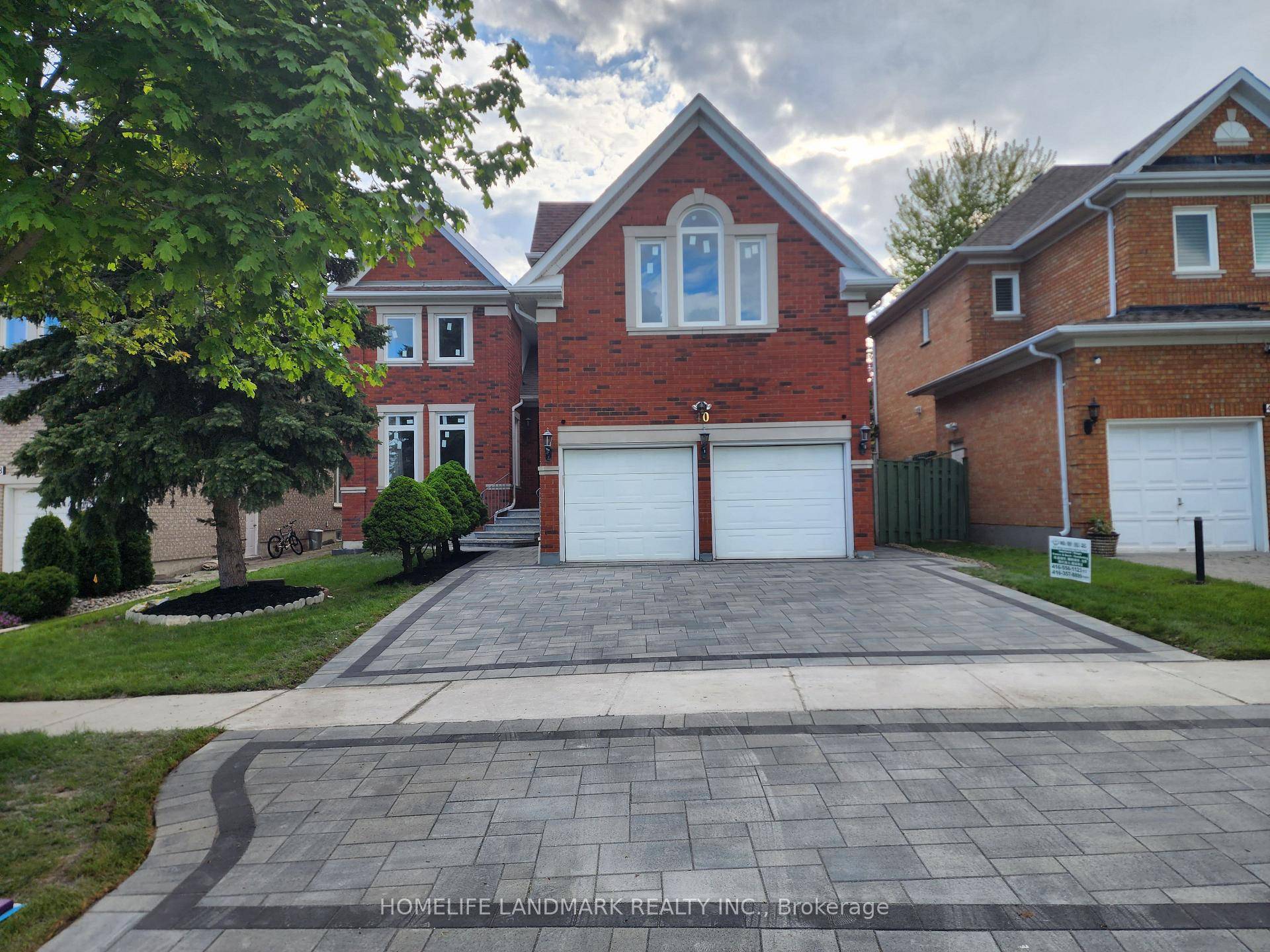 Welcome to this beautifully designed residence featuring a bright and airy family room with a soaring ceiling and skylight.