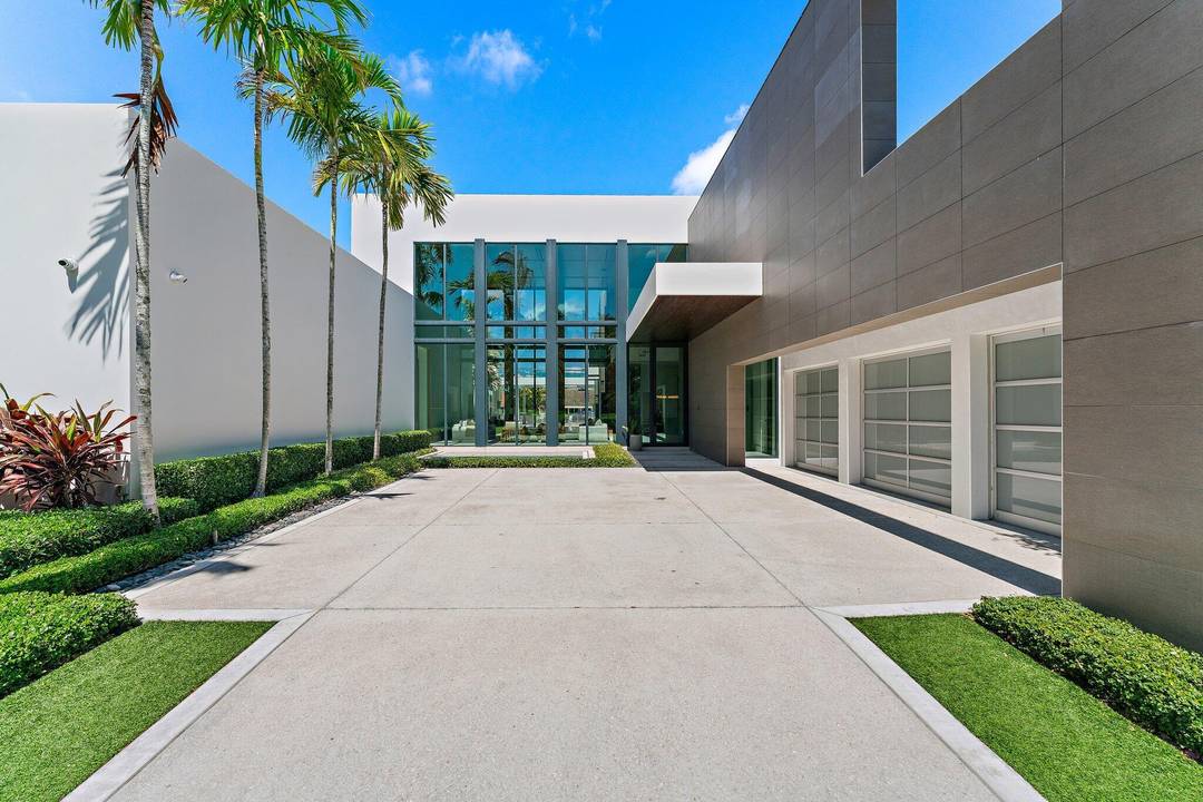 A Masterpiece of Modern Luxury, this residence represents International Style architecture at its finest, defined by clean lines organic materials.