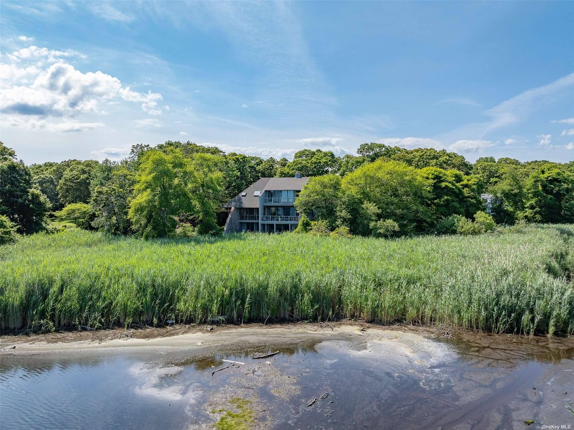 WATERFRONT ! ! ! Nestled in the heart of Bellport Village, this Contemporary Waterfront home offers an ideal retreat for those who are seeking privacy and comfort along with amazing ...