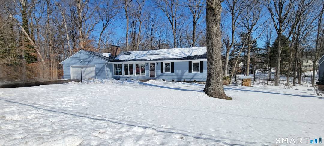 Welcome to 106 Woodland Drive in highly sought after Cheshire !