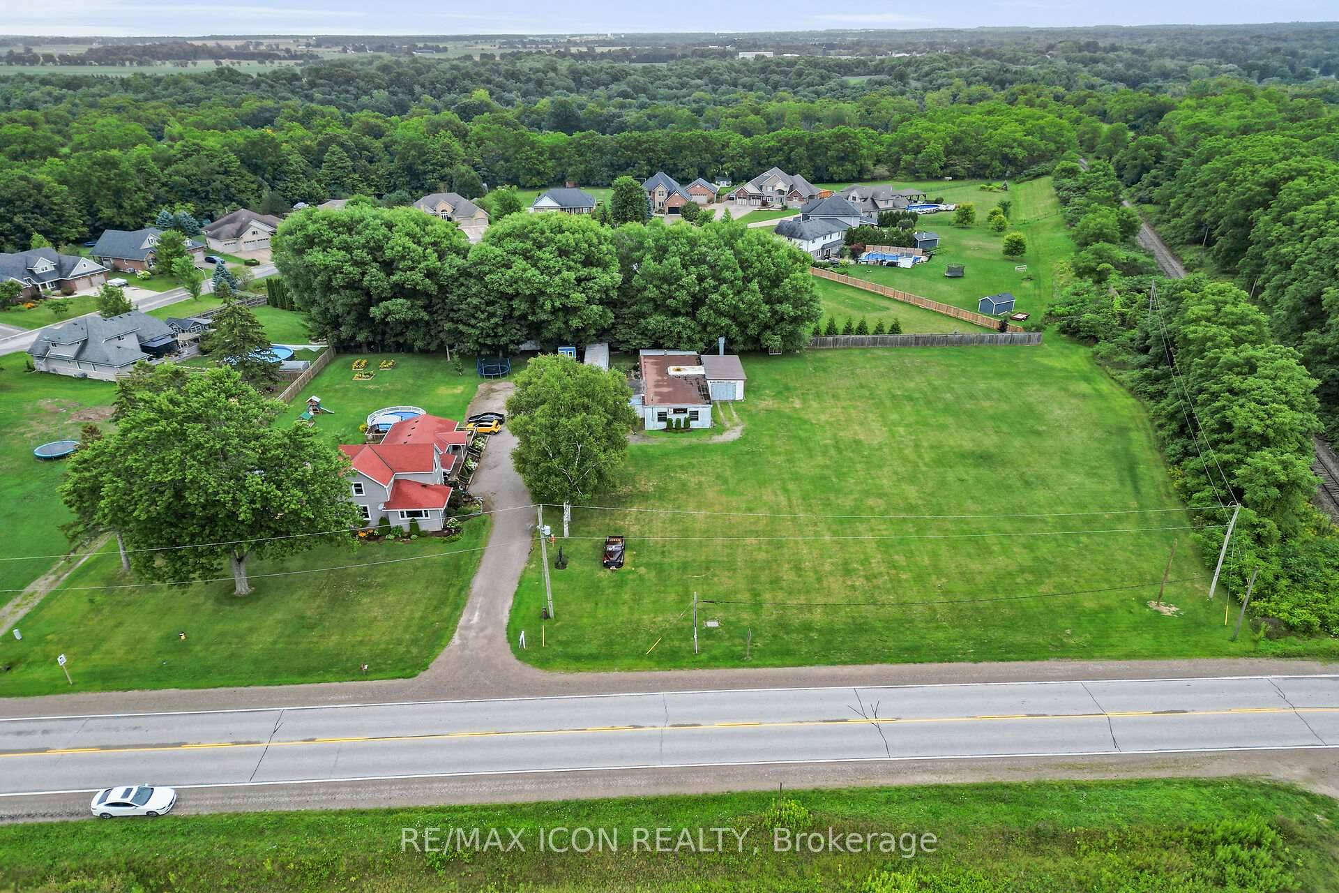 Welcome to 9664 Belmont Rd in New Sarum, a rare opportunity offering a unique blend of residential comfort, income potential, and established businesses on a private 1.