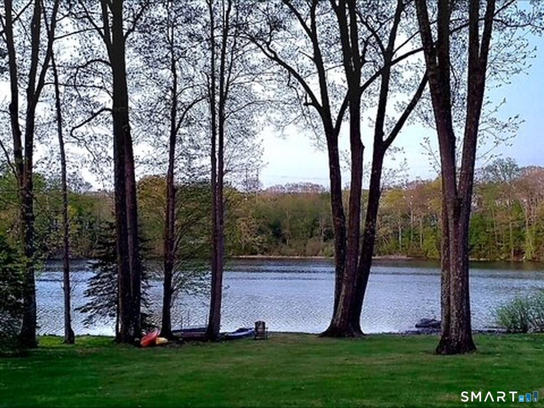 ENJOY SWEEPING WATERVIEWS from this beautifully maintained 3 bedroom raised ranch offering the perfect blend of comfort, style, and functionality.