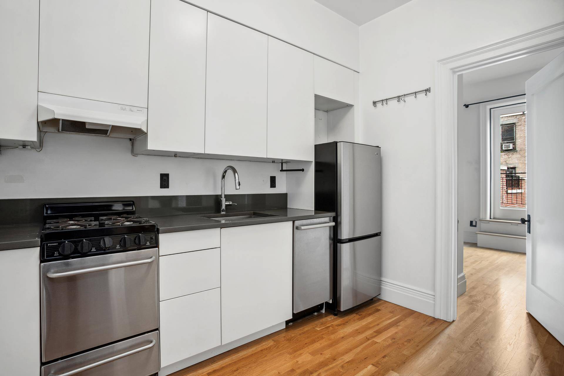Completely remodeled, turnkey one bedroom apartment with a large private terrace in a stunning circa 1900 brownstone !