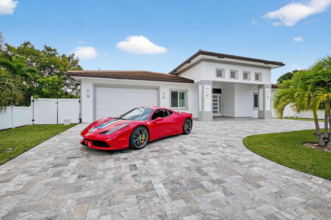 Welcome to your dream coastal living style walking distance to Boca Raton s pristine beaches and exclusive Red Reef Golf Course.