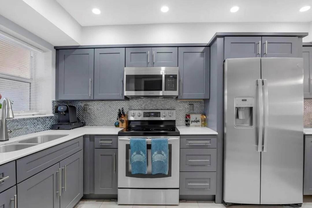 STUNNING WATERFRONT TOWNHOUSE WITH PRIVATE DOCK.