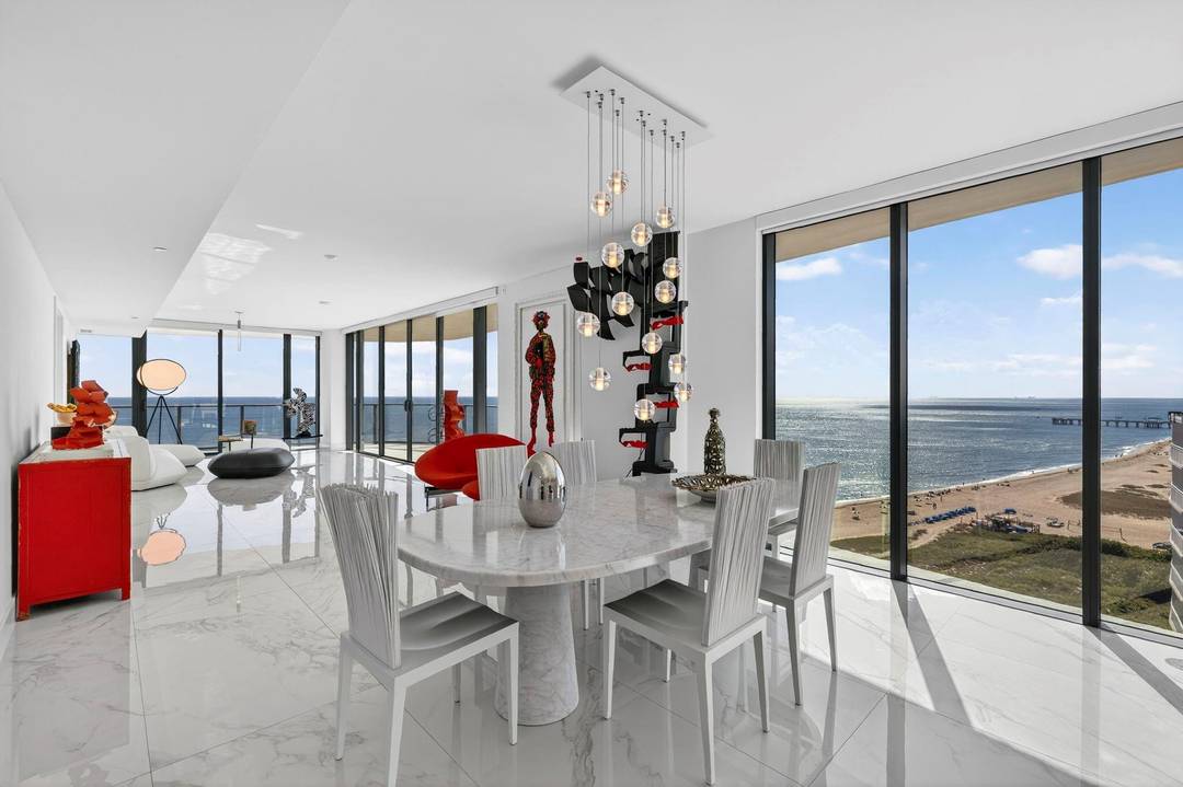 Direct oceanfront living from the coveted southeast corner residence at Sabbia Beach.