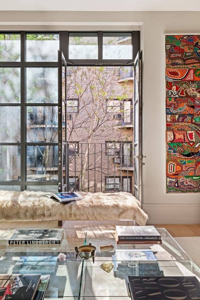 A rarely available, furnished two bedroom, two and a half bath residence at 215 Sullivan Street, a premier boutique condominium in the heart of Greenwich Village.