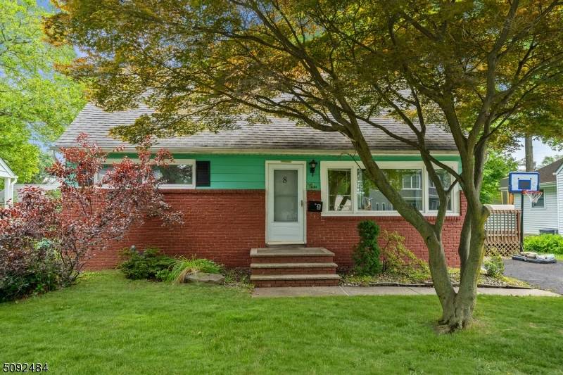 Updated expanded 4 BED 3 Full Baths Custom Cape in the heart of Metuchen.