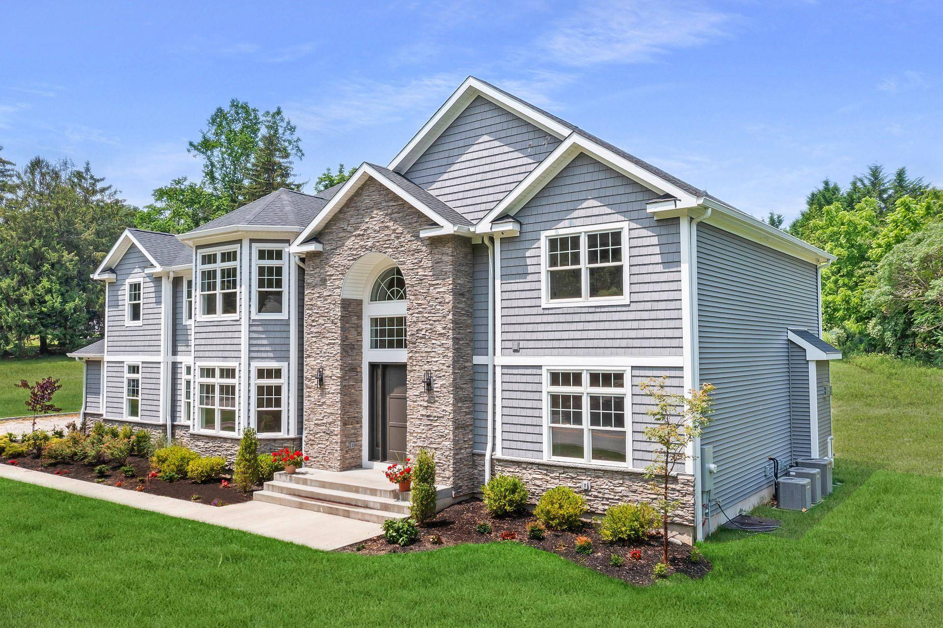 Welcome to 28 Meadow Glen Road, An Exceptional New Construction, Nestled On A Full Acre In The Desirable Fort Salonga Section of Northport, Within The Highly Regarded King Park School ...
