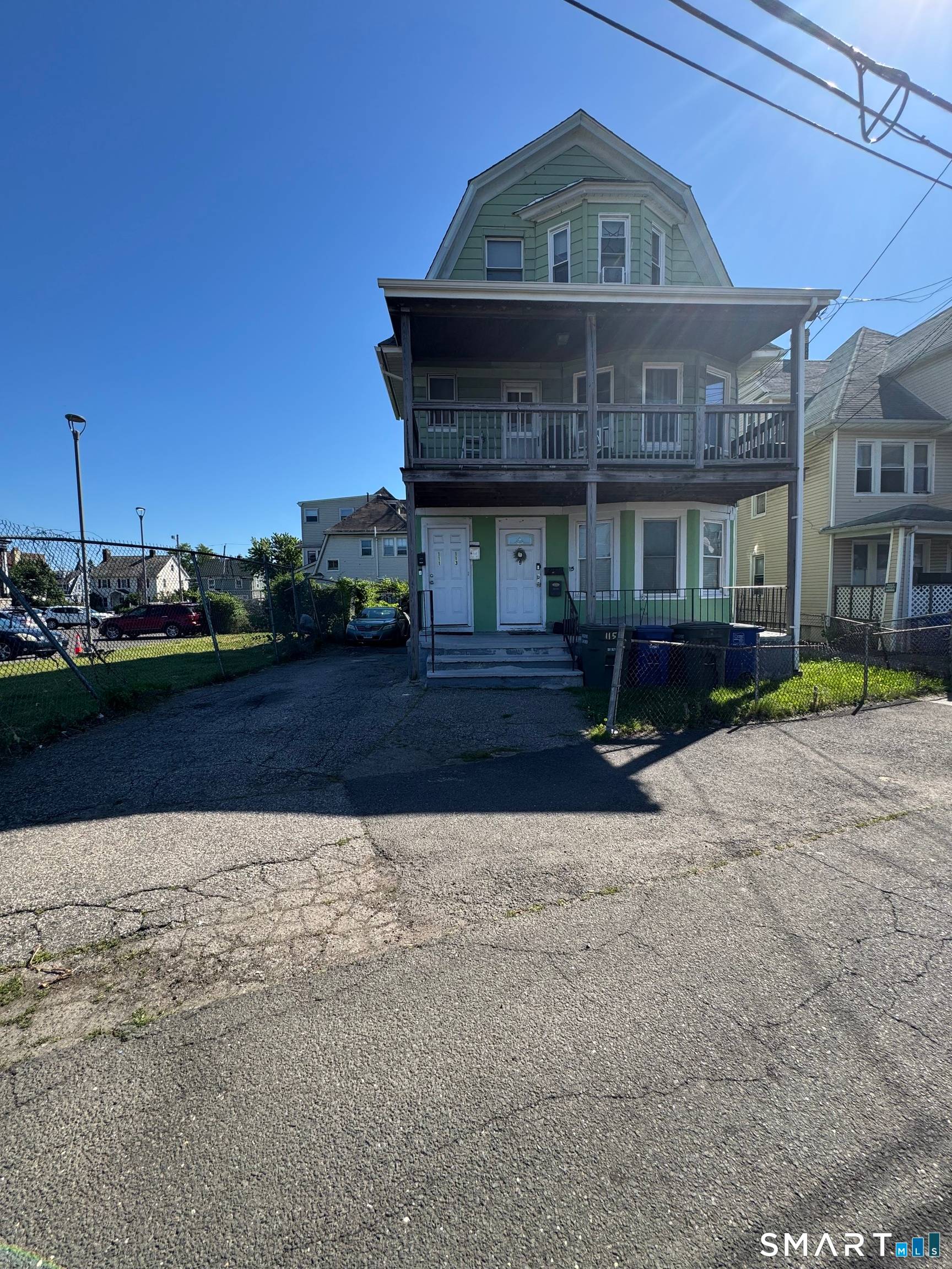 Beautiful 3 family on private street, a must see !