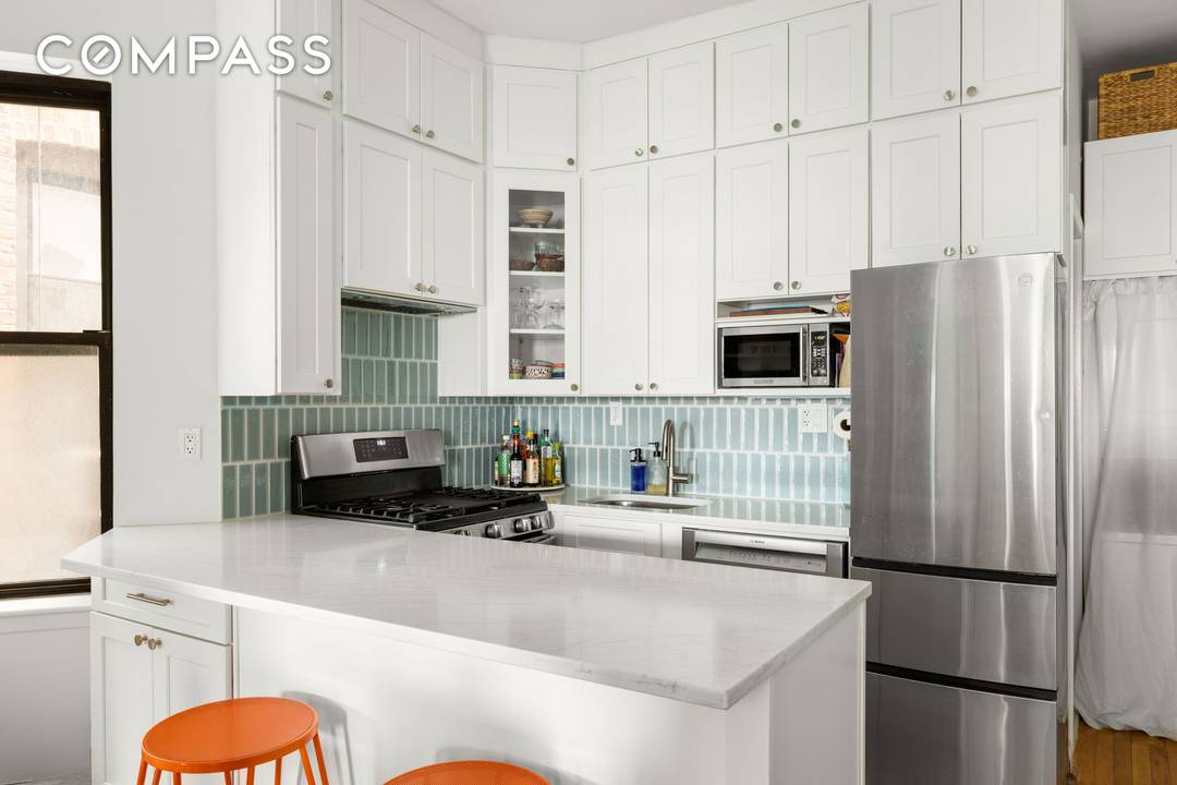 This pristine pre war co op offers a versatile layout, charm, and convenience.