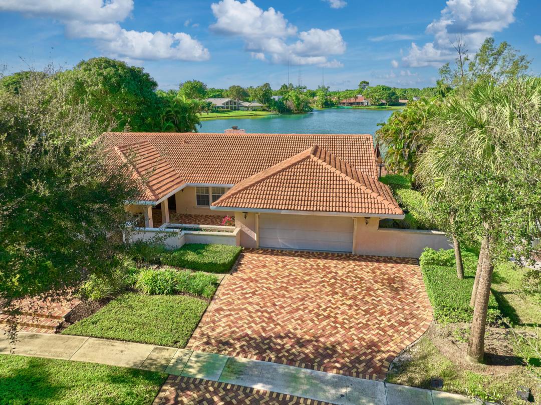 Beautifully renovated and meticulously maintained for 38 years, this exceptional 4BR 2.