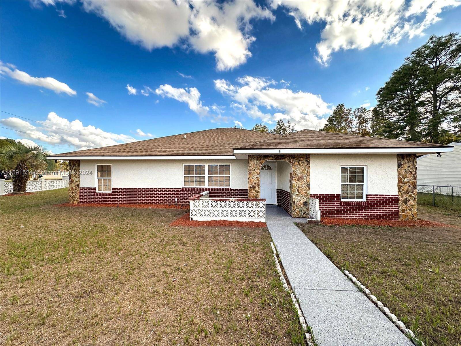Here is a very spacious 4 bedrooms with 2 full bath home.