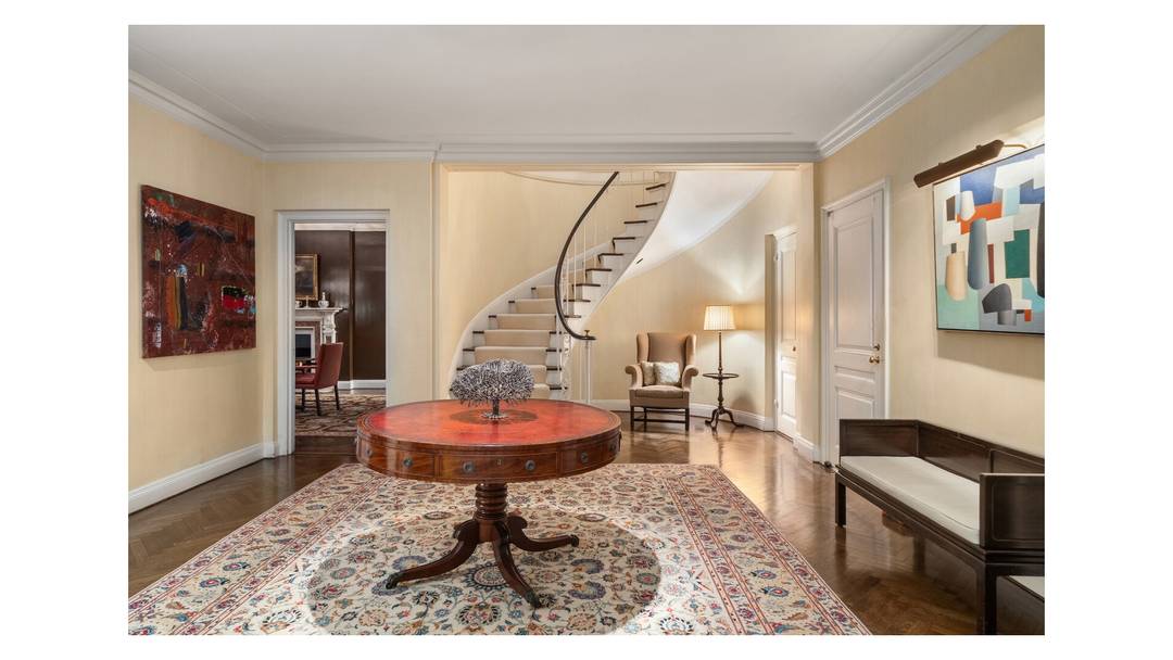 Palatial Duplex Residence This extraordinary 21 room residence occupies the 12th and the 13th floors of 120 East End Avenue, designed by Charles A.