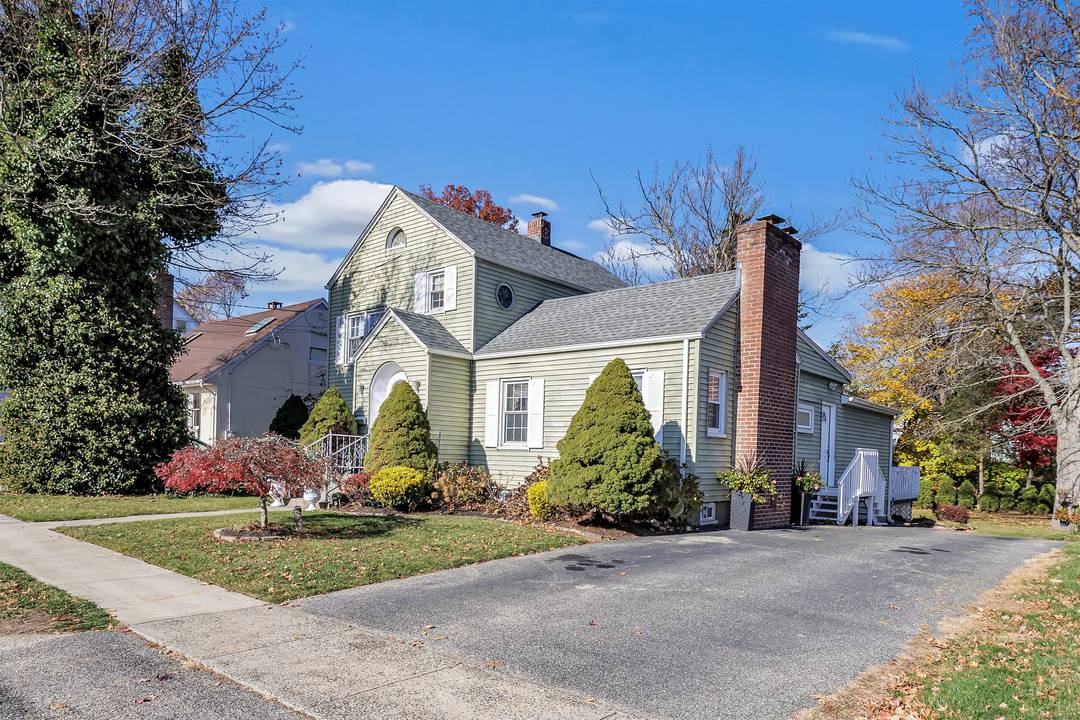 This beautifully appointed Colonial home blends timeless architecture with modern comfort.