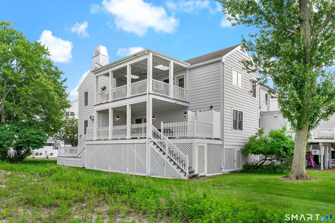 Experience the best of coastal living at 1016 Fairfield Beach Road, a quintessential beachside retreat perfectly positioned for an unforgettable summer.