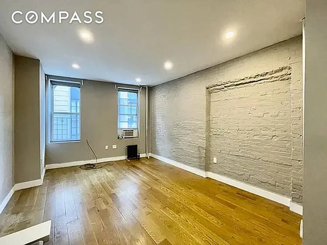 Prime Nolita SoHo Renovated Studio Home Office with W D in unit Renovated kitchen and stainless steel appliances.