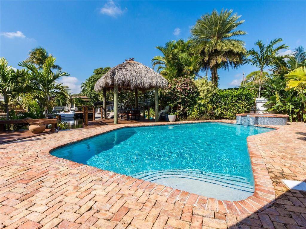 Beautifully renovated 4 3 mid century waterfront pool home in a prime location !