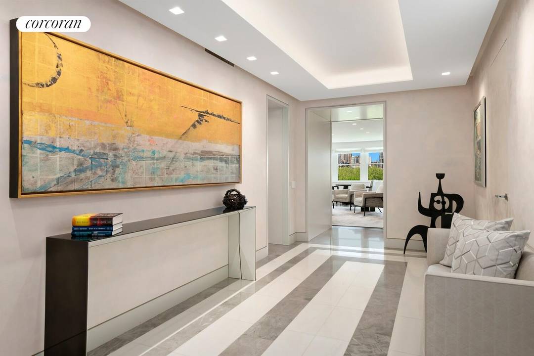 FIFTH AVENUE'S FINEST As you enter Apartment 12A from the attractive semi private landing you sense that you have arrived at a very special home.