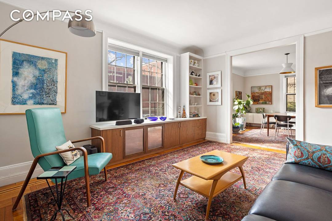 Coveted old world architectural details meld with thoughtful contemporary updates in this renovated three bedroom, two bathroom residence wrapped in leafy views at The Towers one of Jackson Heights most ...