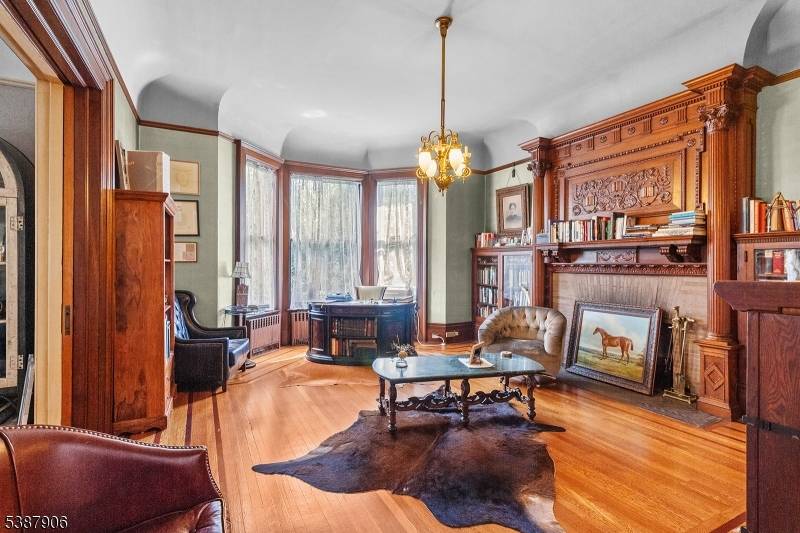 Welcome to this exquisite 8 bedroom, 8 fireplace, all brick Historic single family home !
