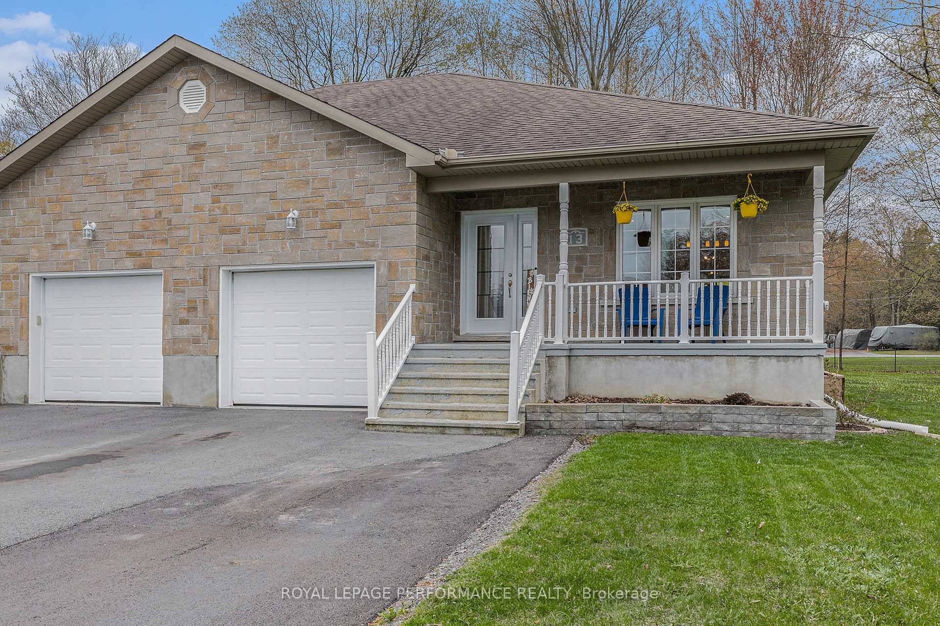 Welcome to 13 Bourque Street in Limoges a beautifully maintained semi detached bungalow backing onto a serene wooded area !