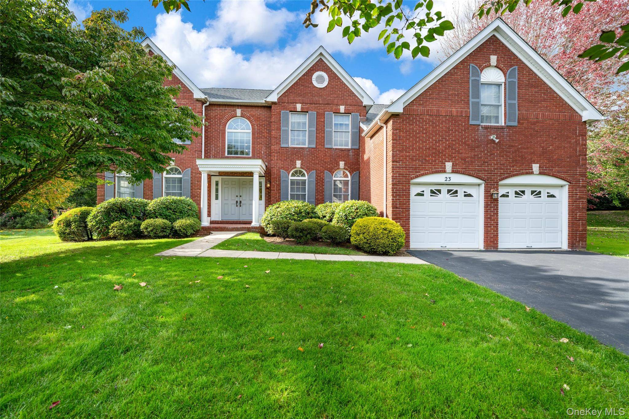 Welcome to this stunning Toll Brothers brick Colonial, flooded with natural light and filled with timeless elegance !
