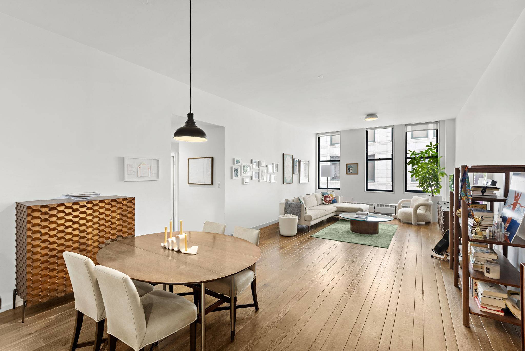 Discover unparalleled sophistication in this exquisite loft style residence at 21 Astor Place, Apt.