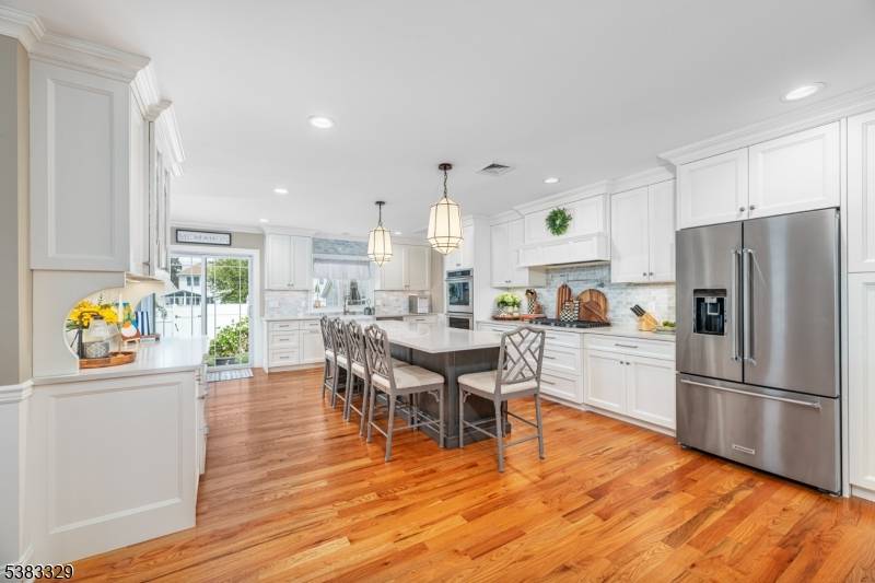 This stunning luxury residence combines timeless design with modern comforts in a prime location near playgrounds, a county park, shopping, houses of worship, major highways, and more.