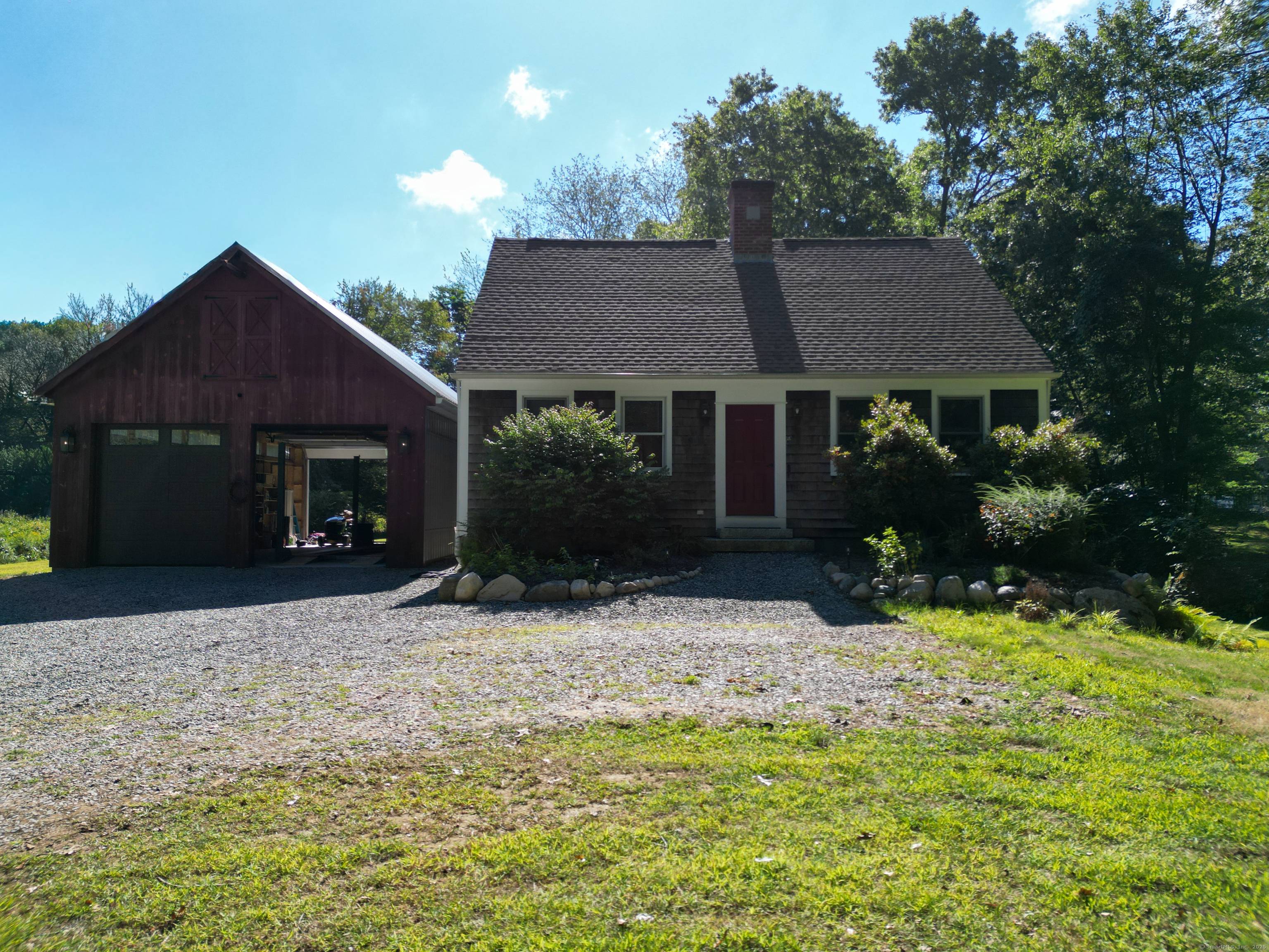 Welcome to this charming 3BR, 2BA Cape Cod style home, beautifully situated on a sprawling 1.
