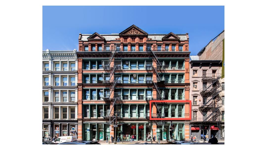 This magnificent loft, situated at 519 Broadway in SoHo, embodies urban elegance.