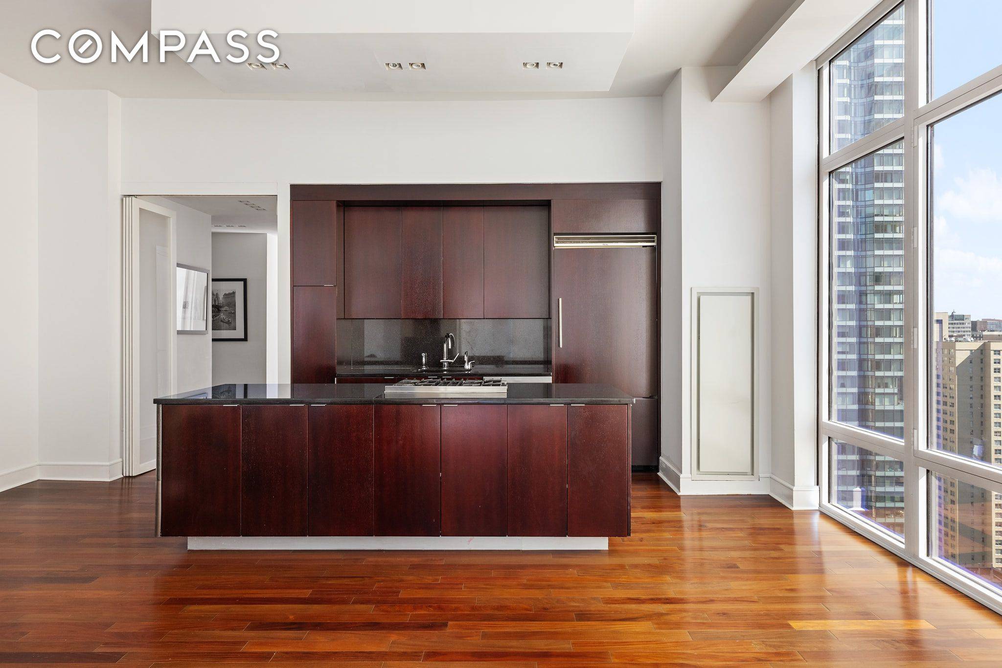 Perched high above Midtown in the renowned Place 57 Condominium, Residence 33B offers soaring ceilings, breathtaking panoramic views, and a gracious 2 bedroom, 2 bath layout spanning 1, 386 square ...