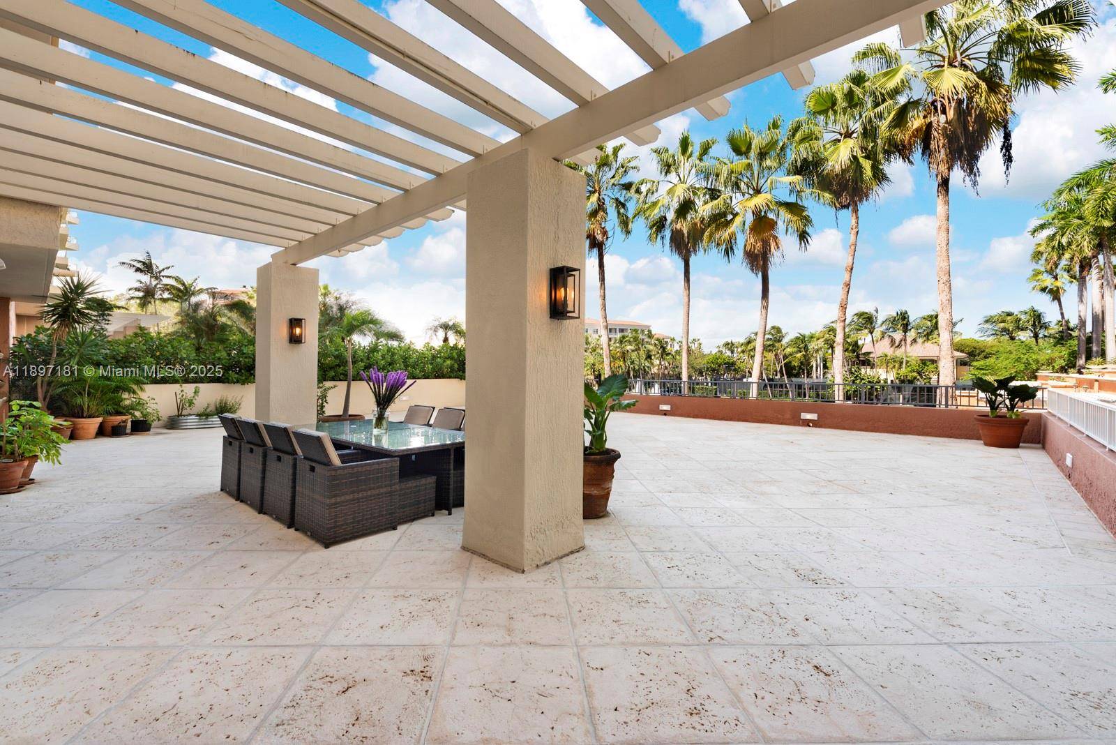 Welcome to a truly spectacular home in the prestigious Lake Tower at Ocean Club.